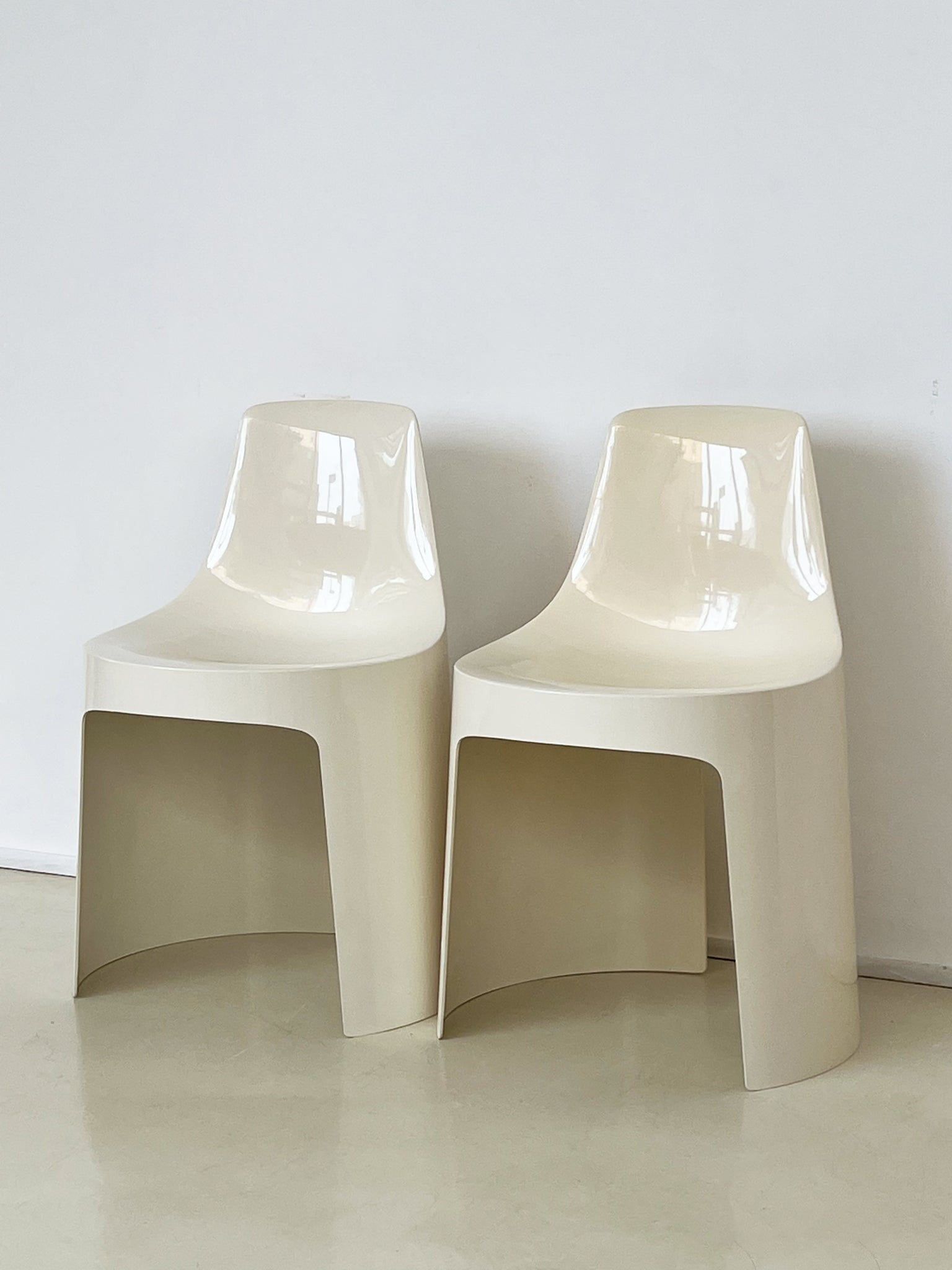 cream plastic chairs