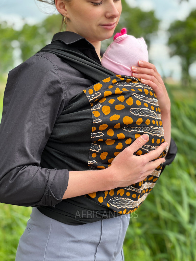 Langwerpig hel Productiviteit Afrikaanse Print Draagdoek / Draagzak / baby wrap / baby sling - Zwart –  AfricanFabs.nl
