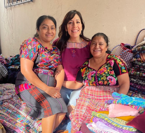 lumily founder giovanna with women artisans in guatemala