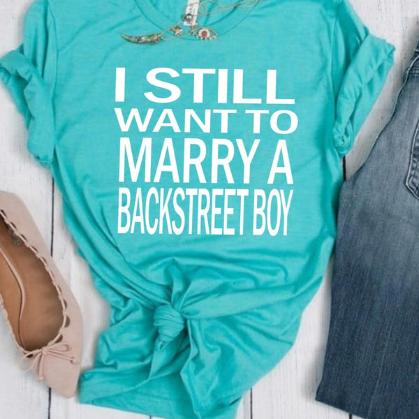 teal shirt with white writing