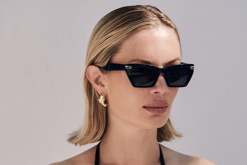 Black acetate sunglasses with dark grey lenses and gold tone hardware #2
