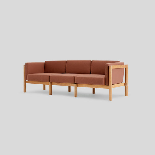 A studio photo of Haven Sofa Sunbrella Rust / Cushion Arm