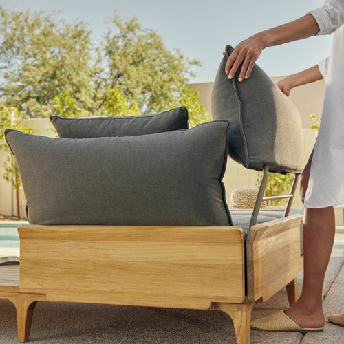 A studio photo of Bluff Chair Sunbrella Parchment