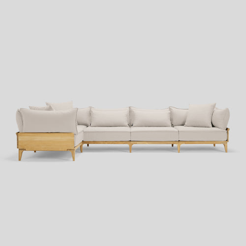 A studio photo of Bluff Sectional Sunbrella Parchment / Five Piece