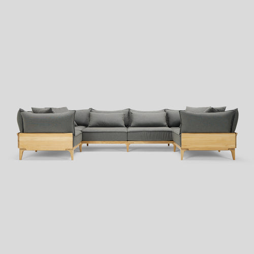 A studio photo of Bluff Sectional Sunbrella Graphite / Six Piece U-Shape