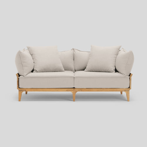 A studio photo of Bluff Loveseat Sunbrella Parchment