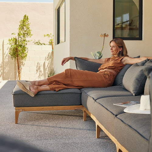 A studio photo of Bluff Chaise Sectional Sunbrella Parchment / Five Piece with Chaise