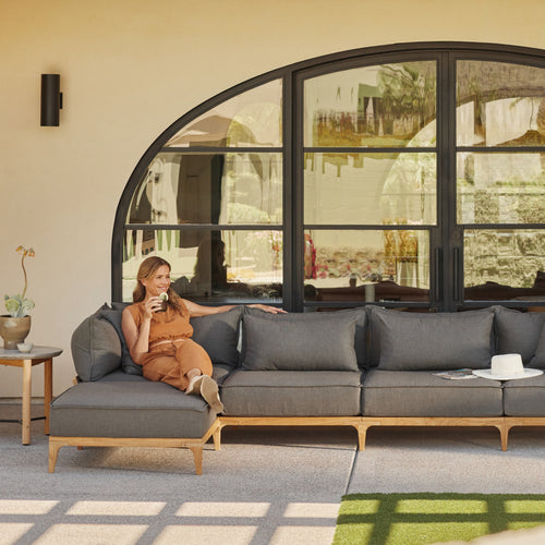 A studio photo of Bluff Sectional Sunbrella Graphite / Six Piece U-Shape