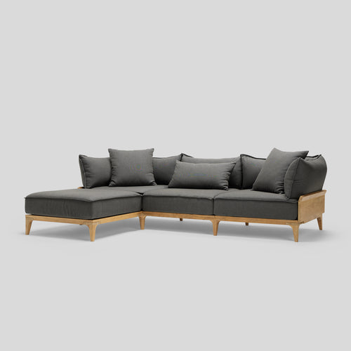 A studio photo of Bluff Chaise Sofa Sunbrella Graphite / Sofa with Chaise