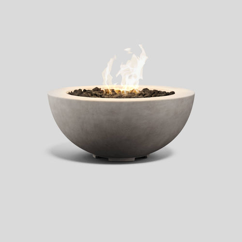 A studio photo of Coupe Fire Table - Natural Gas Stone / 39