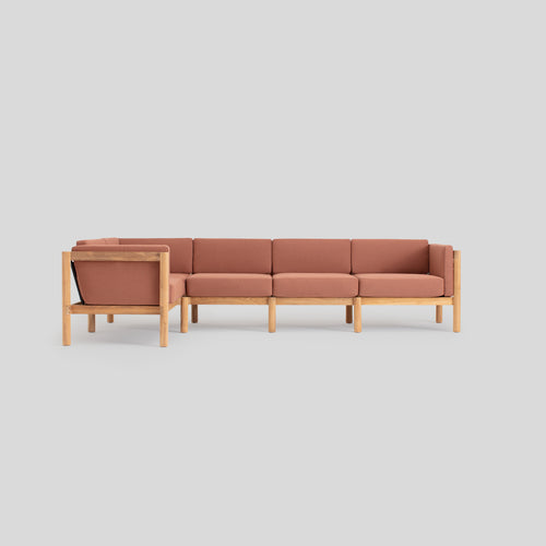 A studio photo of Haven Sectional Sunbrella Rust / Five Piece / Cushion Arm