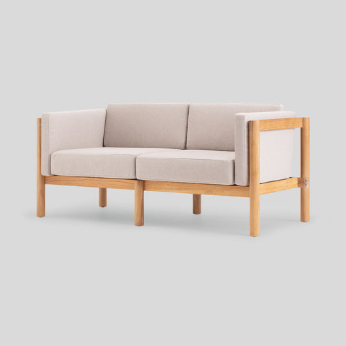 A studio photo of Haven Loveseat Sunbrella Ashe / Cushion Arm