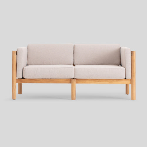 A studio photo of Haven Loveseat Sunbrella Ashe / Cushion Arm