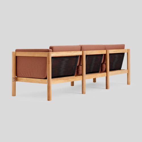 A studio photo of Haven Sofa Sunbrella Rust / Cushion Arm