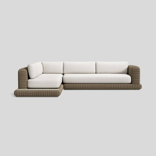 A studio photo of Roundabout Sectional with Side Table Natural | Sunbrella White