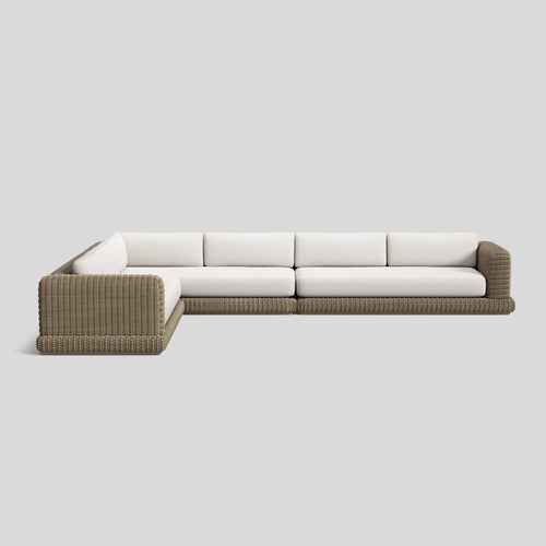 A studio photo of Roundabout Sectional Natural | Sunbrella White / Three Piece - Seats 8