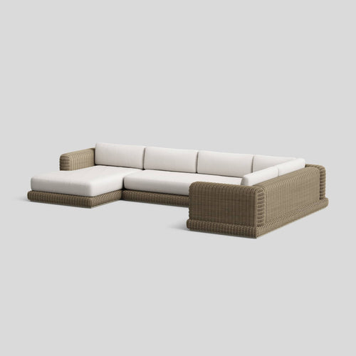 A studio photo of Roundabout Chaise Sectional Natural | Sunbrella White / Left Chaise