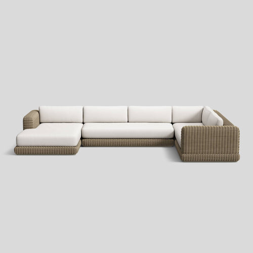 A studio photo of Roundabout Chaise Sectional Natural | Sunbrella White / Left Chaise