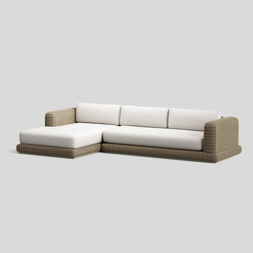 A studio photo of Roundabout Chaise Sofa Natural | Sunbrella White / Left Chaise