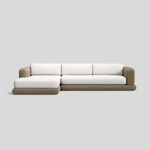 A studio photo of Roundabout Chaise Sofa Natural | Sunbrella White / Left Chaise