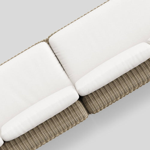 A studio photo of Roundabout Chaise Sectional Natural | Sunbrella White / Left Chaise