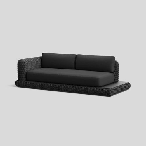 A studio photo of Roundabout Sofa with Side Table Charcoal | Sunbrella Char