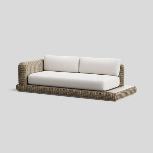 A studio photo of Roundabout Sofa with Side Table Natural | Sunbrella White