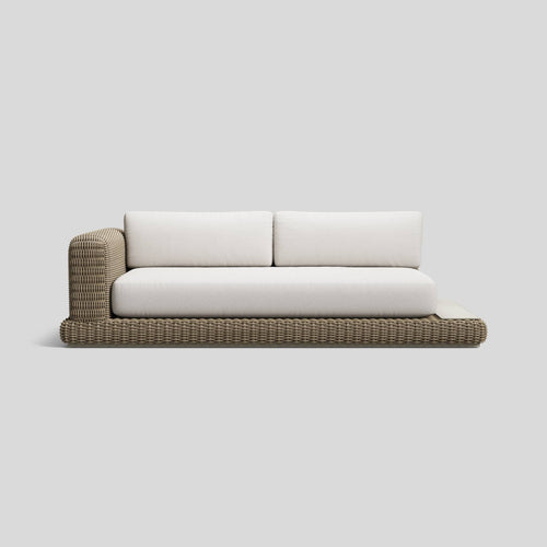 A studio photo of Roundabout Sofa with Side Table Natural | Sunbrella White