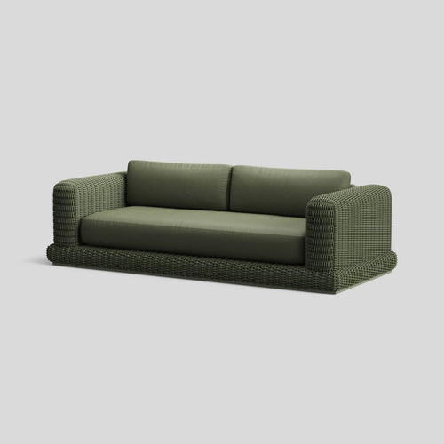 A studio photo of Roundabout Sofa Olive | Sunbrella Jadeite