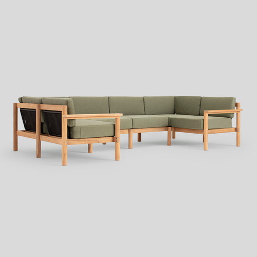 A studio photo of Haven Sectional Sunbrella Leaf / Six Piece U-Shape / Teak Armrest