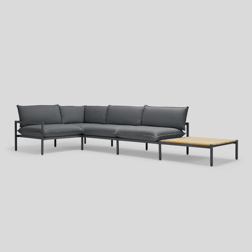 A studio photo of Terra Sectional with End Table Charcoal / Four Piece with In-line End Table / Table