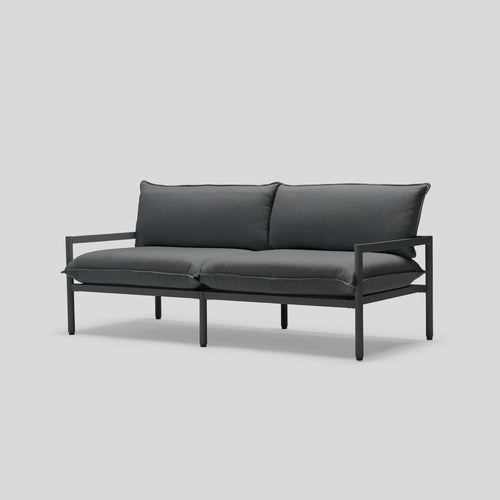 A studio photo of Terra Loveseat Charcoal