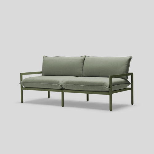 A studio photo of Terra Loveseat Olive