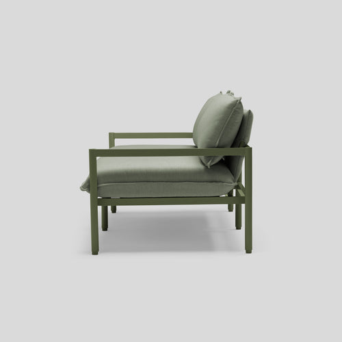 A studio photo of Terra Loveseat Olive