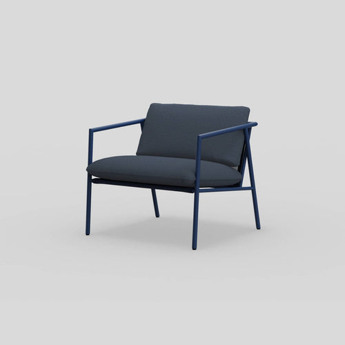 A studio photo of Trase Chair Iris | Sunbrella Denim / Single