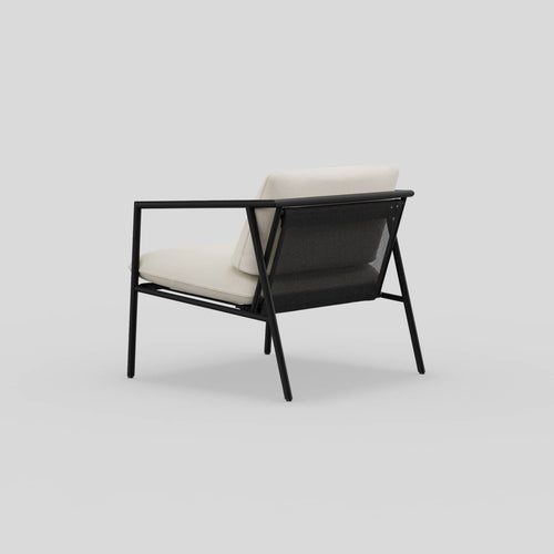 A studio photo of Trase Chair Charcoal | Sunbrella Cloud / Single