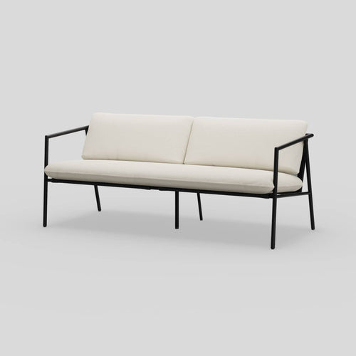 A studio photo of Trase Sofa Charcoal | Sunbrella Cloud