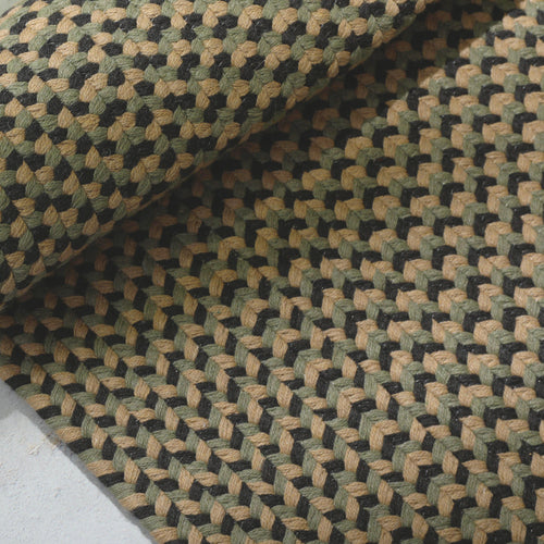 A studio photo of Tri-Braid Rug Basil / 6' x 9'