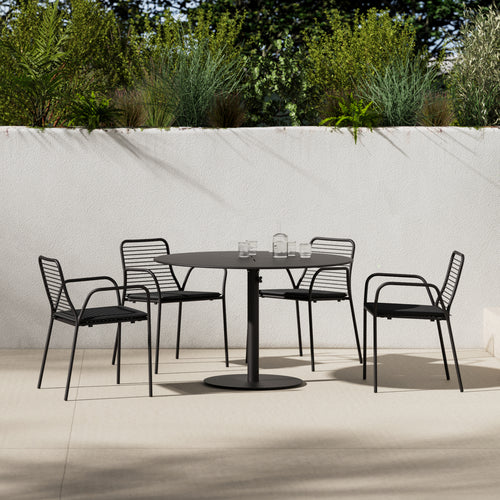 A studio photo of XY Dining Set White / Arm