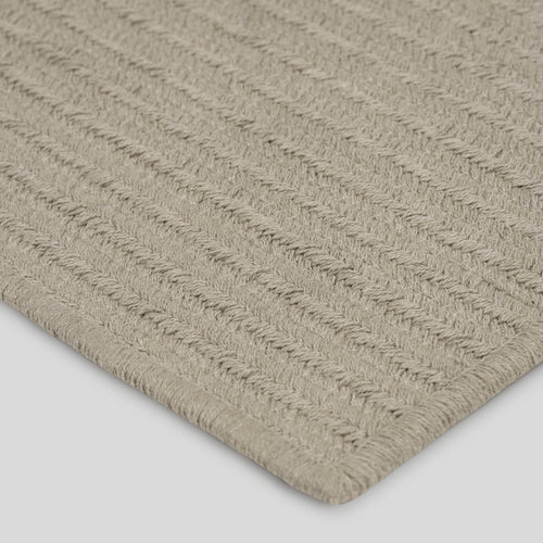 A studio photo of Braid Rug Wheat / 6' x 9'