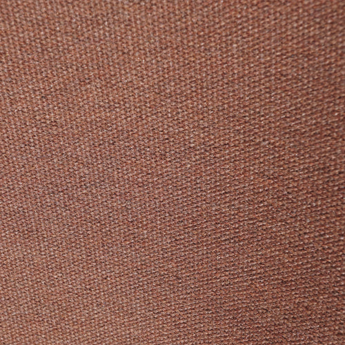 A studio photo of Haven Sofa Sunbrella Rust / Teak Armrest