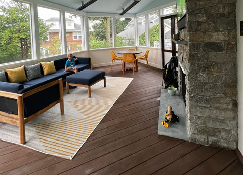 Sectional inside a screened-in porch