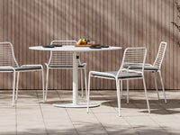 Lifestyle shot of a white XY Dining Set