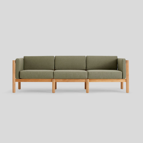 A studio photo of Haven Sofa Sunbrella Leaf / Cushion Arm