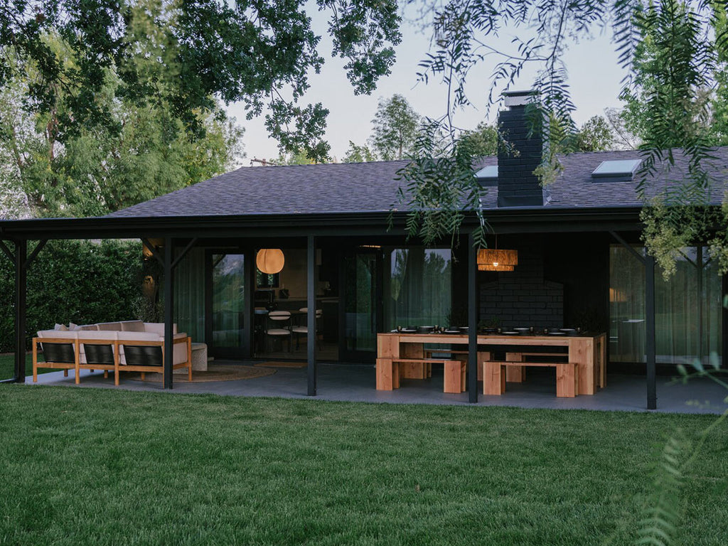 Neighbor teak outdoor furniture on patio