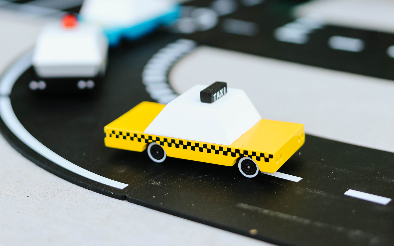 yellow taxi toy car