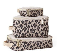 cheetah print itzy ritzy organizing bags stacked on top of one another 