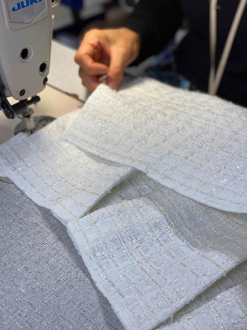 seamstress sewing fabric squares
