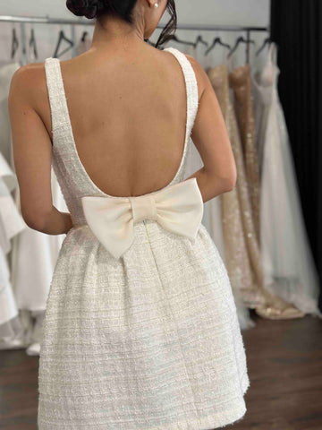 u-back bridal mini with bow back made from luxurious bridal tweed