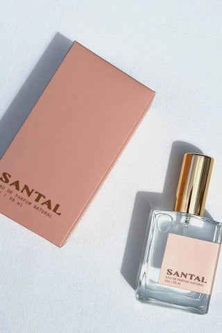 NOMAD DESIGN CO. SANTAL PERFUME. Experience the luxurious scent of Santal with Nomad Design Co's Perfume Roller. A perfect Le Labo 33 dupe, this organic and vegan roller combines the indulgent aroma of sandalwood with the nourishing benefits of coconut oil. Enjoy the convenience of a roll-on applicator for a long-lasting scent. Elevate your senses today!